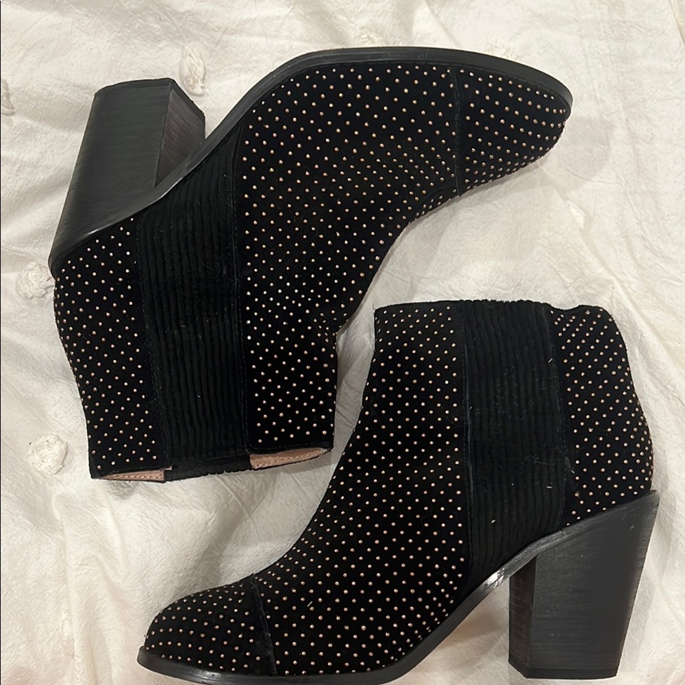 Anthropologie studded heeled booties.
